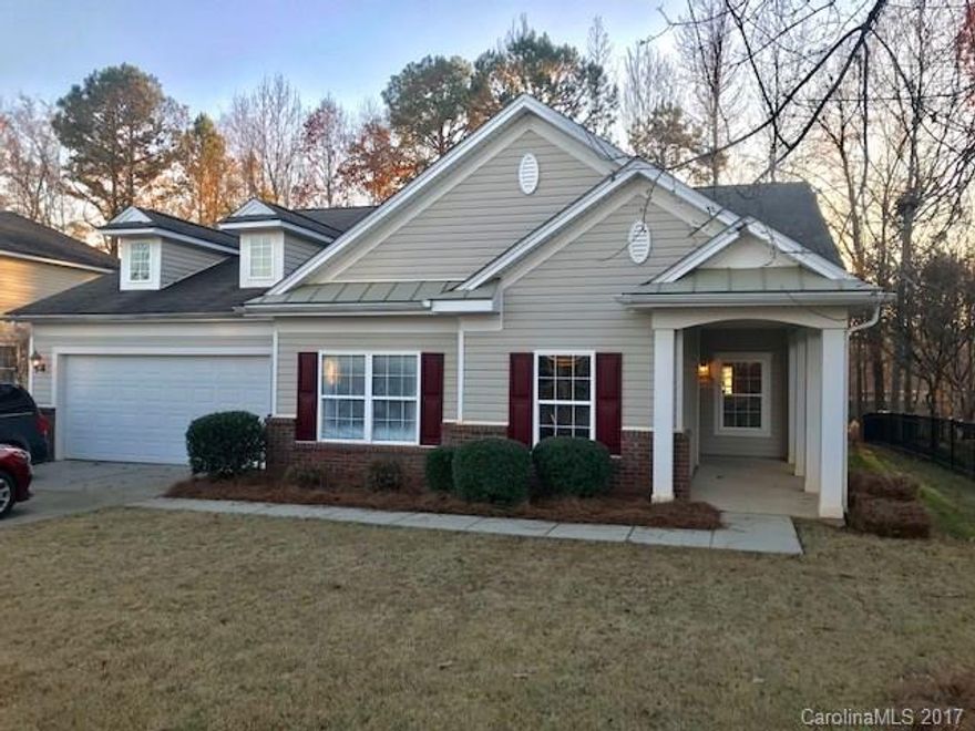 Immaculate 4 Bedroom, 2 Bath Ranch, 9' ceilings, move in ready. Open Floor Plan w/laminate plank flooring in kitchen and great room.  Large Kitchen w/Breakfast Bar, Breakfast Nook & Huge Pantry.  Raised vanities in both bathrooms, new 10' x 14' deck overlooking wooded area.   Spacious Master Bedroom w/Private Deluxe Master Bath & Walk In Closet.  Home has a irrigation system, wonderful community w/Pool & Tennis Courts. Currently updating home, shows like new construction.