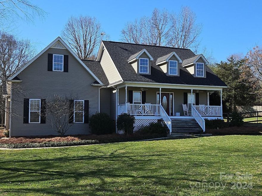 Absolutely Beautiful Floor Plan-YOU WILL FEEL AT HOME!  Rocking Chair Wide Front Porch w/view of Pasture - French Doors lead to Roofed back Porch w/ Fenced Yard for Pups or Kids play.  Enter Stain Glass Door to Vaulted Foyer w/ Trey Ceiling Dining Room. Vaulted Great Room is OPEN-LOTS OF WINDOWS to view back yard. Open Plan to Breakfast Bar Island in Kitchen/ Breakfast Area with Bay Window.  Primary Bedroom with Large walk in closet and adjoining Laundry rm.  Main Bath with Soaking tub/shower.  Split Bedroom plan-2  bedrooms on other side of home. BONUS-2nd level -Wood Stairs to unfinished HUGE ROOM OVER GARAGE & over PRIMARY BEDROOM Originally Plumbed for wet Bar. Increase SQ FT area of home when finishing this. ADDITIONALLY, walk in storage on 2nd level. WELL BUILT Home & is wired for surround sound- Walk in Crawl Space w/Humidifier. 
HIGH CEILING Garage w side door & separate secure area inside garage.  Front fenced Pasture & Large  Hay Barn need repair ALOT ACTIVITY HIGHEST & BEST