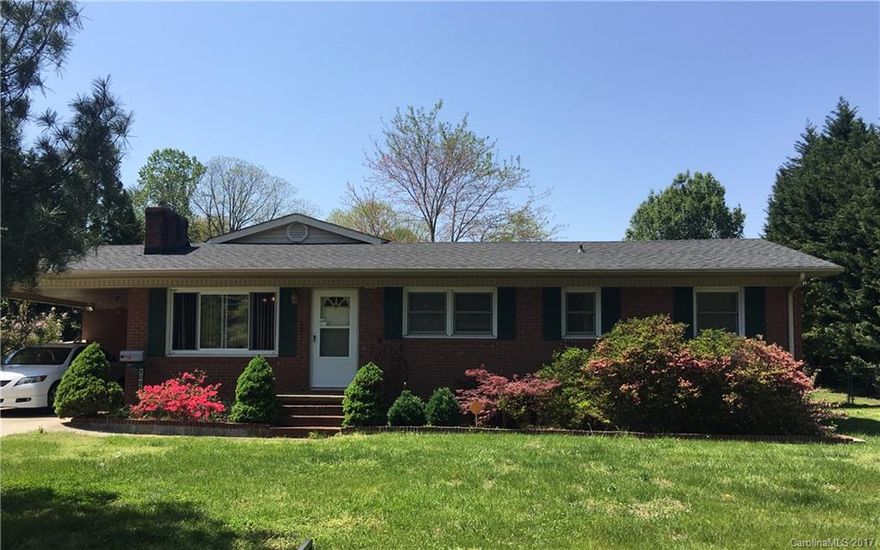 Location, location, location! This brick home sits in a quiet neighborhood right inside the city limits. You will love the updated kitchen, extra space to spread out, and the detached garage. The addition on the extra den/ sunroom space is just what you are looking for in this price range, it is perfect as a playroom, extra family room, or make it a formal dining room. Kitchen was update with granite and stainless appliances. Newer roof, and easy to move in to!