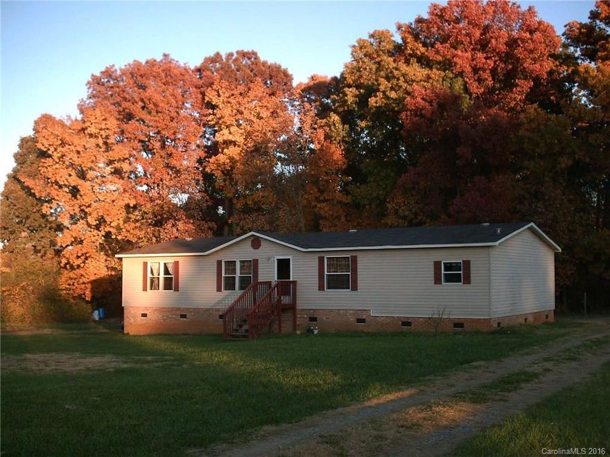 Lots of room - inside and out.  Gorgeous covered back porch, wood burning fireplace and glamour bath in Master.  Step down kitchen and living room.  The house has 3 bedrooms, but the septic system is for a 2 bedroom home.  The owners have had no problems with the septic system.