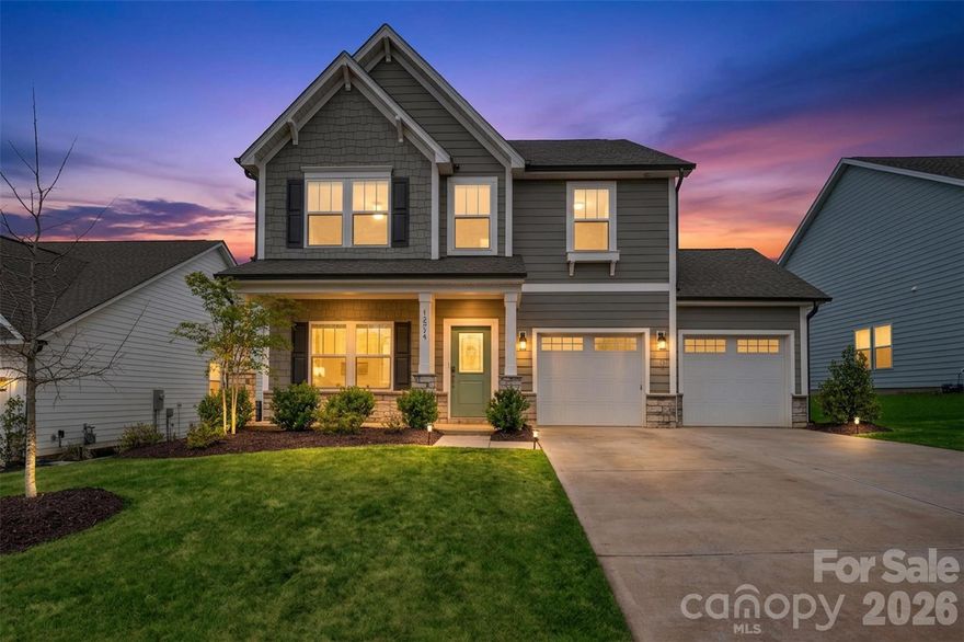 Discover the Inverness plan at Edgewater—Charlotte’s 2024 MAME Community of the Year—offering a thoughtful blend of style, function, and modern comfort.

The main level features a private study, ideal for a home office or flex space, along with a beautifully appointed kitchen showcasing upgraded quartz countertops, tile backsplash, gas range, modern lighting, and a painted-finish island—perfect for both everyday living and entertaining.

Upstairs, the spacious Primary Suite impresses with a tray ceiling and a well-appointed ensuite bath. Two additional bedrooms, a full bath, a versatile game room, and a conveniently located laundry room with folding table complete the second level.

Beyond the home, Edgewater delivers a true lifestyle experience, featuring a top-ranked public golf course, access to a recreational boating and fishing lake, and exciting upcoming amenities—including fine dining, expanded golf and racquet facilities, and retail offerings.

NOW OFFERING UP TO $2,900 IN LENDER-PAID CLOSING COST ASSISTANCE WHEN BUYER CHOOSES TO FINANCE WITH THE SELLER'S PREFERRED LENDER. CONTACT LISTING AGENT FOR DETAILS.