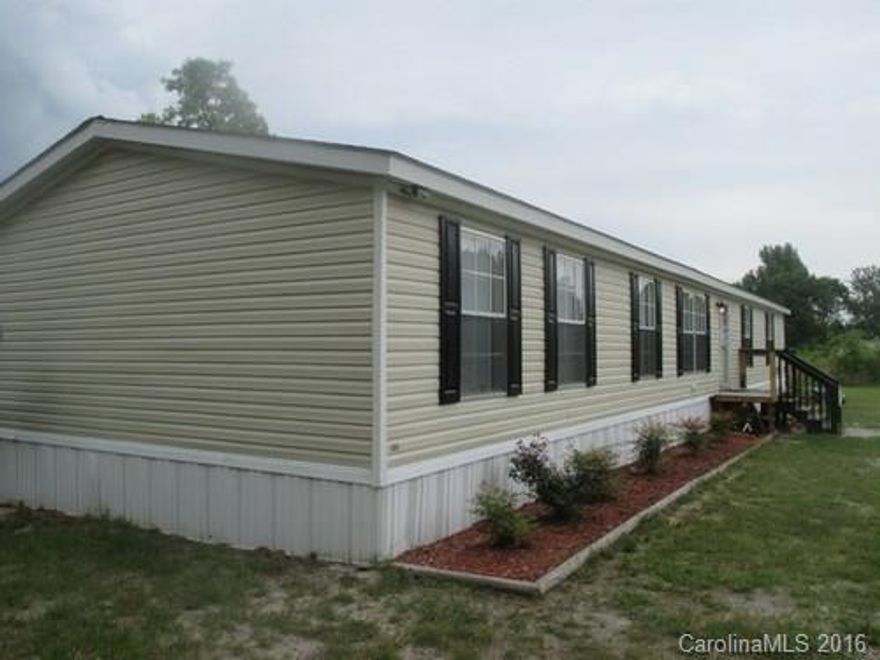 2011 Clayton Approximately 1748 Sq Ft 3 Bedrooms 2 Full Baths Garden Tub Separate Shower Den Living Room Dining Kitchen Vinyl Underpinned  Central Heat and Air 1 Acre Lot Financing for most credit situations.