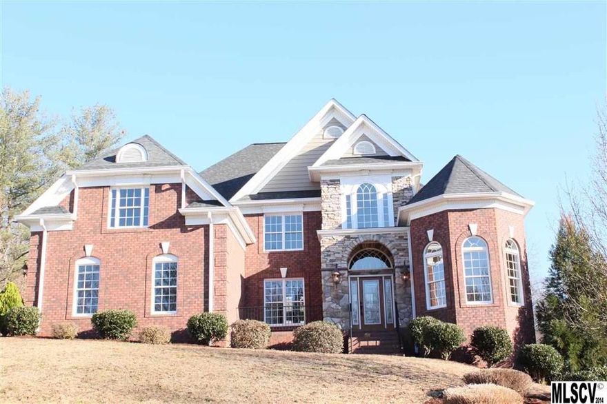 Lake Hickory Gated Community/Northwest boasting the ultimate location on North Side of the City/Club house/swimming pool w/optional boat slips when available. Elegant formal/informal rooms promote executive entertaining. Elaborate detail with high ceilings, tray ceilings, moldings, elegant master suite/FP, tall ceiling, grand bath on main level w/heated floors, gourmet kitchen w/keeping room/FP/wrap around windows, 4 spacious bedrooms/second level. Unfinished basement with walk out to side yard, three car garage/main level, central vac, 0.44 acre, expertly crafted by Builder Dan Grogan in beautiful Moore’s Ferry.