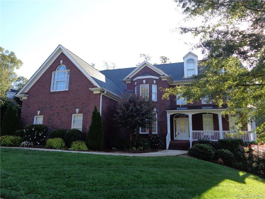 5 bedroom 5.5 bath home is located in the exclusive Mt Isle Harbor Subdivision! This home has a 3 car side load garage, screened porch, Large deck, basement with theater room and bar/billiards area, and an in-law suite on the main floor. The living room has a fireplace and built-in's. The kitchen has double ovens and a gas stove inset in the granite countertops and a separate butlers pantry. The master bedroom has separate sitting room and a fireplace. Call and schedule a private showing today.
