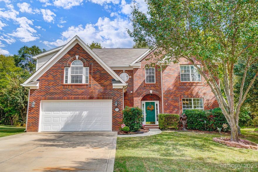 5 bedroom 3½ bathroom home in Mooresville's sought-after Glynwater neighborhood, quiet cul-de-sac. When you walk in you find high ceilings, an open-concept kitchen, and a living room with a gas fireplace that is perfect for entertaining. A large dining room you could easily turn into an office, home-school classroom, or game room. Two large closets, a large powder room, and a laundry room. The second floor boasts a large owner’s suite, bathroom ensuite and walk-in closet and 3 other bedrooms. The 5th bedroom and full bathroom with its own stairway, over the garage makes a wonderful room for the in-laws, an office, or a teenager. LARGE 3-car garage/workshop.  New AC in 2022. Gas tankless water heater, and range. Walk outside and enjoy a large deck, shed, and private wooded yard.  Conveniently located near Downtown Mooresville's booming restaurants, shopping and golf course.