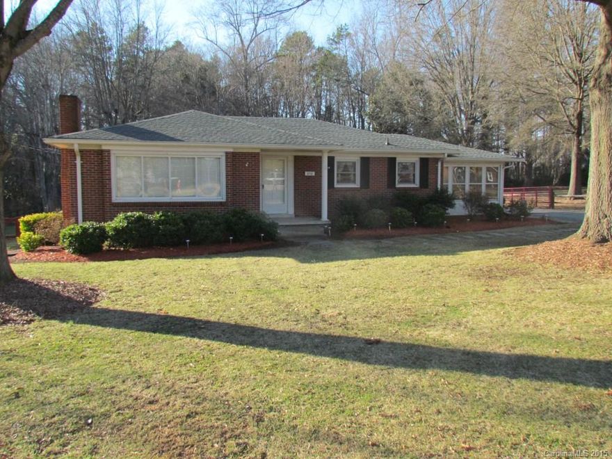 All brick home w/upgrades galore! New HVAC & Furnace 2013. New roof 2013. Newer windows. New water heater w/expansion tank 2013. Remodeled kitchen w/custom cabinets, appliances, & tile backsplash. Original hardwood floors in living rm, hallway & all 3 bedrooms. Gas logs & surround sound in living room. The basement has endless possibilities of use. Lg flat yard in front & back. Enjoy the deck or enclosed sun porch. Backyard is fully fenced & separate fenced area for pets. Storage shed.