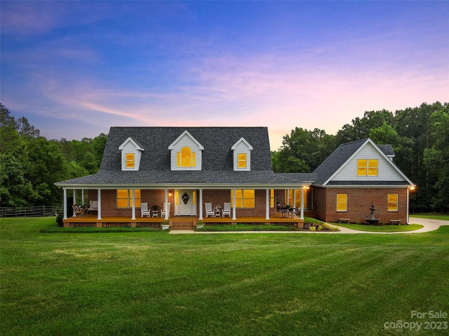 Nestled on a sprawling 24.83-acre parcel, 190 Kelseys Mill offers a harmonious blend of natural beauty, modern luxury, and self-sufficiency. This property boasts a main residence with 3 beds/2.5 baths AND a secluded bedroom with ensuite bath situated above the main garage, a perfect space for teens, guests or an office! The oversized garage, built in 2023, meets all storage needs while featuring a second living area tastefully done with luxury finishes. Rest easy knowing that a whole house generator, solar panel and manual well pump are ready to keep your home running smoothly. From the heated saltwater pool, private trails (in addition to the Enclave's Nature and Riding Trails) to open pasture, not to mention the orchards and chicken coop, you'll have endless opportunities to create your own paradise. Whether you envision equestrian pursuits, farming, or simply relishing the beauty of nature, this property grants you the space and resources to make it a reality.