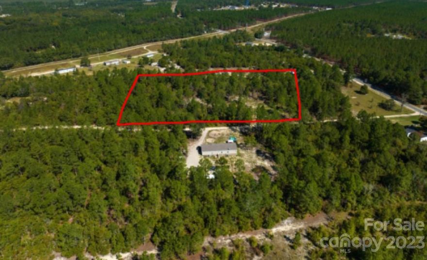 Step into a world of sustainable living and natural beauty with this picturesque 5.41-acre landscape, nestled just minutes away from convenience stores and a local restaurant in Kershaw County, SC. As you explore this remarkable property, be captivated by the majestic mature trees and gentle rolls, providing an ideal canvas for your dream home or retreat. Towering natural wonders offer soothing shade and privacy, creating a tranquil haven. Land has an active septic permit for a 3-4 bedroom house, with power and public water readily available at the street. Plus, there are no HOA restrictions, ensuring freedom and flexibility in your plans. With easy access to essential amenities in charming Cassatt and proximity to larger cities like Kershaw, Camden, and Charlotte, this