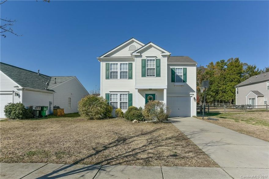 Open floor plan living in the heart of Steele Creek. This home has curb appeal and the inside is just as pretty.  Spacious family room is open to the kitchen with a large eat in area.  Downstairs you will also find a 1/2 bath, pantry & 1+ car garage.  Upstairs are 3 generous sized bedrooms.  One guest room has an en suite!  The master with vaulted ceiling and big closet are luxurious! Newer flooring throughout. Don't miss out the fenced yard, patio & shed on this home.  Make it yours in 2017!