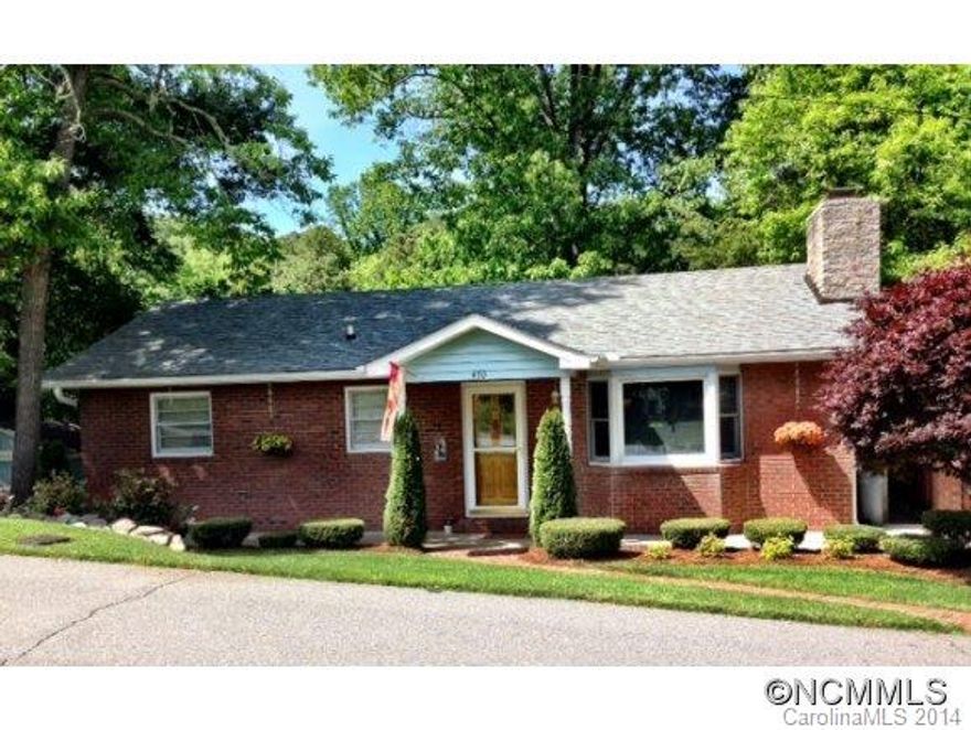 Walk to the Lake in this pretty as a picture and neat as a pin Junaluska Jewel! Features include a newer roof, newer electrical, new heat pump, new dishwasher, and new kitchen floor! Look out at the trees and lush landscaping from your shaded back deck or long range mountain views from your front porch. The lower level has a full apartment complete with kitchen, bedroom, bath and living room, perfect for inlaws, children or rental.