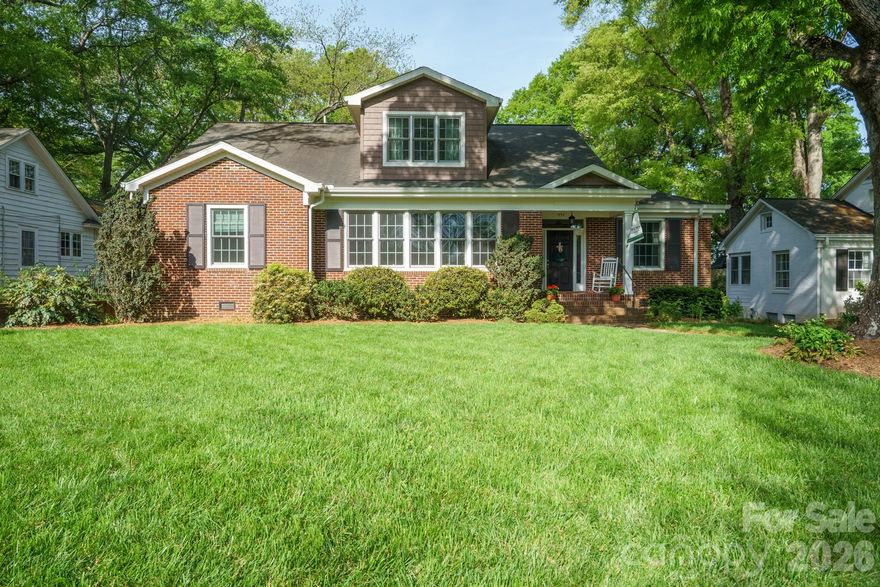 Beautifully Updated Home in the highly desirable Oakwood area of NW Hickory, featuring two parcels totaling approximately 0.42 acres. Enjoy the convenience of walking to schools and downtown while living in a move-in ready home packed with upgrades! The main level showcases a stunning primary suite created in 2023, along with gorgeous updated lighting throughout, 9-foot ceilings, and rich hardwood floors. The inviting foyer opens to a spacious living room with a wood-burning fireplace (gas starter) & a separate study with built-ins.  The foyer also flows seamlessly into the dining room area and an updated kitchen designed for both function and style. The kitchen features solid surface countertops, a center island with seating, breakfast bar, pantry, updated cabinetry, and quality appliances. Just beyond, the light-filled den offers large windows overlooking the level backyard—perfect for relaxing or entertaining. The primary suite is a true retreat with a large walk-in closet with built-ins, an additional closet, and a spa-like bath complete with dual custom vanity, abundant storage, and an oversized tile and glass shower with seating and rain shower. A second full bath on the main level includes a jetted tub, walk-in shower, and updated vanity. Upstairs offers three additional bedrooms and a full bath, providing plenty of space for family or guests. Outside, enjoy TREX decking with a retractable awning, a level yard, and a detached 3-car garage built in 2018/2019. Additional updates include main-level HVAC (2020) and some replacement windows (excluding basement). A partial unfinished basement for storage and utilities plus crawlspace too. This home truly has it all—style, space, and location. Move-in ready and sure to go quickly!