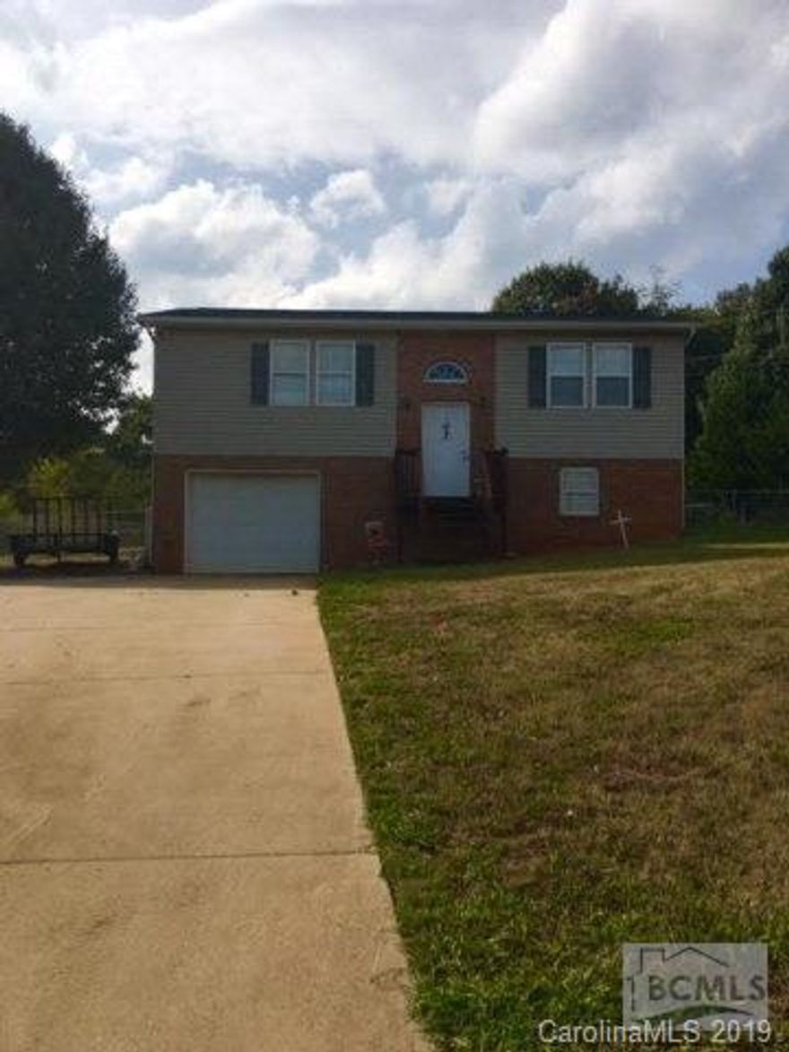 Great value on this updated home! Let's start w/ the kitchen.. new stylish cabinets, granite counters, closet pantry, and tile backsplash. Main floor has laminate hardwoods, updated light fixtures , wood blinds, no carpet anywhere on main floor! Spacious master w/ walk-in closet. Hall bath with new vanity w/ granite top and and linen closet. Downstairs in 3rd bedroom and laundry/utility room with plenty of storage area. Outside enjoy covered back deck w/ fully fenced in yard. One car garage w/ opener and extra graveled parking area. Storage building w/ power and metal carport. NEW 30YR ROOF 2016. Over 40k in upgrades!!! Don't miss out on this one while interest rates are still low!