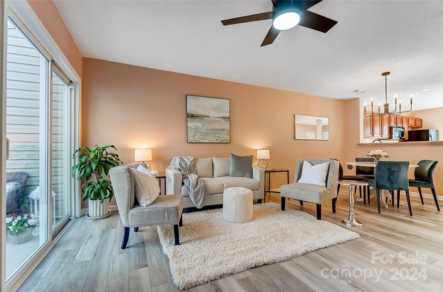 Get ready to fall in love this Valentine's Day! The Location and Charm doesn't get better than this. Gorgeous and well-maintained home with lots of New Upgrades. Turn-key! New roof, all new paint, new luxury vinyl plank flooring throughout, all new hardware on doors and cabinets, new backsplash in the kitchen, new mirrors in bathrooms, and all new light fixtures throughout for an elevated modern design! Open living room with fireplace & gas logs. 2 Primary suites with vaulted ceilings!!! Enjoy NC's wonderful weather on the back patio with friends grilling or sipping wine with fully fenced-in privacy.  2 Community Pools and a pond! The location is within walking distance of RiverGate Shopping, groceries, and dining. Lake Wylie, McDowell, the park is minutes away.