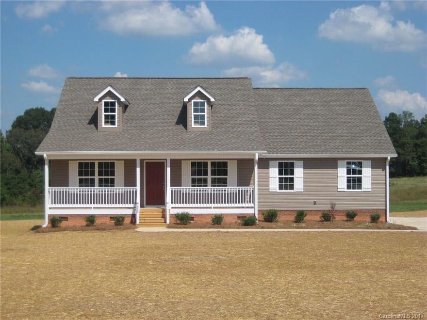 Country Living, Vinyl siding ranch w/ Split bedroom plan, Kitchen w/ granite, island, pantry, Vaulted family room, kitchen, dining & hallway w/ laminate flooring, 2 Car garage, Covered back porch, 2.39 Acre Lot.