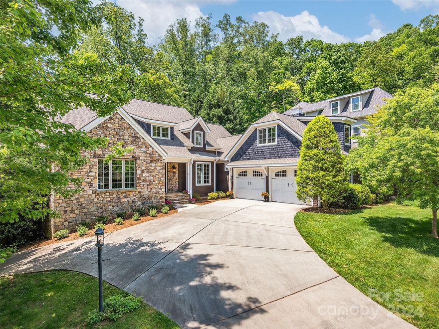Exquisite quality-built South Asheville home! Impressive finishes include 10ft ceilings, rich molding, and gleaming hardwood floors. Versatile floor plan ideal for those seeking 2 primary bedrooms on the main floor. Here, 2 walk-in closets, separate his & hers vanity rooms and a shared tub/shower area afford privacy and togetherness. Spacious kitchen, walk-in pantry, and laundry room. Upstairs offers a bedroom with bath & oversized family room with vaulted ceilings. Delightful screened and covered porch with wood paneled ceiling, skylight and an open patio ideal for grilling accessed from the great room via French doors. Need more space? The extensive 2000+ sf lower level boasts wet bar, family room, 4th bedroom, bathroom & more storage than you’ll ever need. Everywhere you look, comfortable spaces for work, play, fitness, and hobbies await. When the need to leave arises, you’ll love having TC Roberson schools and Biltmore Park less than a minute away!