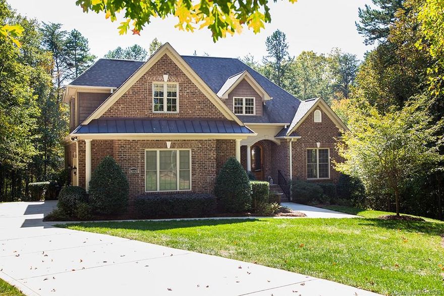 Approx. 177' of shoreline with private pier and floating dock in super convenient location! Custom, full brick home boasts all amenities you are looking for. Mahogany entry door, covered porch w/unique iron work, tile & marble foyer, formal dining w/spruce ceiling. GourmetmKitchen w/glass front cabinets, granite counters, newer appliances, CT backsplash. Master on main, w/sitting area & tray ceiling. Lg bonus rm, 2 bedrooms & office up! Relax on brick patio by lake overlooking peaceful cove.