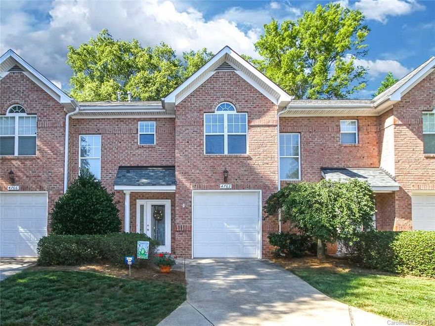 Fall in LOVE-All brick 3 bed, 2.5 bath South CLT Townhome with ALL the Upgrades! Walk to Park Rd Shops & Restaurants.  Open Plan, New Paint, Crown Molding (main floor), Living Room has Custom Built Ins, 5" hardwood & wired for TV Mount over Fireplace. The Fab Kitchen has Granite, SS Appliances, White Cabinets, Designer Backsplash and Tile Floors. Wainscoting in 1/2 bath.  Master has Vaulted Ceilings and Wainscoting. Relax on the patio with water feature & ground lights. Workbench in Garage!