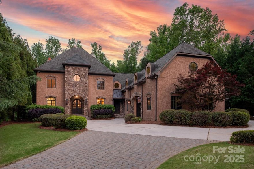 Beautiful luxury home with resort backyard featuring a pool, outdoor kitchen, covered terrace and fire pit on a great cul de sac lot in popular Providence Downs community. Floor plan includes a primary on main with large walk in custom closet that features a dedicated washer and dryer. Main floor also includes a private office with french doors plus a lovely Great Room with wood burning fireplace (with gas starter) and a wall of windows overlooking the private backyard. Kitchen includes beautiful quartzite tops, commercial Thermador gas range (2024), pot filler faucet, copper sink + additional veggie sink and a walk in pantry. Kitchen opens to a cozy breakfast area with stacked stone wood burning fireplace. Upstairs includes 5 secondary rooms, 3 full baths, a spacious bonus room, laundry room + an additional office. Don't miss the HUGE unfinished attic! Freshly painted neutral interior! New updated light fixtures! Zoned for Marvin Schools.