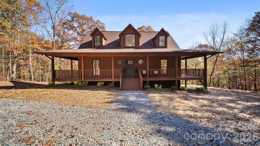 If you are desiring privacy, space and unlimited potential with NO HOA - this is the one! Tucked away on just under 2.7 wooded acres, this thoughtfully updated 3-bedroom, 2.5-bath home offers both seclusion and convenience—just minutes from downtown Mt. Pleasant’s charming dining and shopping area. 

You will be warmly greeted by a cozy, covered front porch - perfect for morning coffee, relaxing with a good book or enjoying evening breezes. Step inside to find fresh paint, modern lighting, and an updated kitchen featuring refreshed cabinetry, granite countertops with peninsula seating, stainless steel appliances, and a sunny bay window breakfast nook. A formal dining room just off the kitchen features a second charming bay window that overlooks the side deck and serene wooded views.  This flexible space is perfect for entertaining and could also easily serve as a home office or a playroom. The main level laundry room is located steps from the kitchen and can double as mudroom with an exterior door to the side deck, providing ease to daily routines and offering practical storage/organization solutions. The open living room boasts cathedral ceilings, rich natural light, and sliding doors that open to the expansive wraparound deck that invites you to grill, entertain, dine outdoors or unwind with a glass of wine, making you feel completely immersed in nature and a world away from it all. 

The main-level primary suite offers a spa-like retreat with an oversized walk-in tiled shower and quartz countertops on your double vanity. Upstairs you’ll find two spacious bedrooms, a full bath, and new carpet throughout. Red oak hardwoods flow through the main living areas, complemented by new LVP in the kitchen, laundry, stairs, and second-floor bath.

The unfinished walkout basement offers endless possibilities for future expansion, workshop, storage or even a garage, providing an additional 1,383 square feet of opportunity to finish as you choose. See artist rendered image for just one way you can utilize all the extra space!

Enjoy the feeling of being tucked away in nature while being close to all the charming amenities that Mt. Pleasant has to offer—this is the best of both worlds!