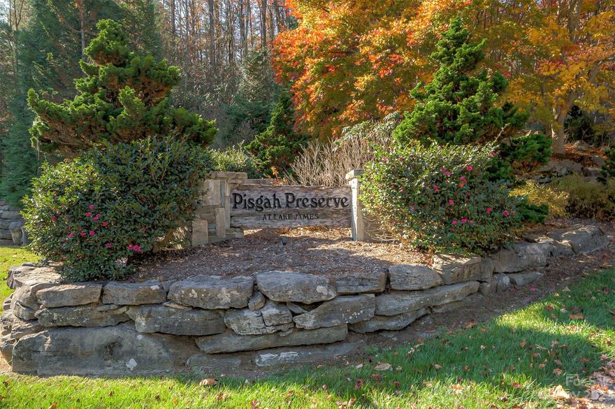 Vacant lot #54 is an easily accessible partially wooded lot. The perfect sloped building site has been cleared and is ready for the construction of your mountain dream home.  This property is surrounded by 36.89 acres of common open space owned by the community. Pisgah Preserve is a gated community designed with preservation in mind with extra acreage dedicated to open space, a community reading cabin, a picnic shelter, a fire pit, a horseshoe pit, and miles of walking trails. This desirable rustic home community is just minutes to Lake James, public boat ramps, a marina and restaurant, the new 3000 acres of Paddy's Crk State Park, and Blue Ridge Parkway. Underground electricity and roads were constructed to NCDOT specs. Well, and septic are needed. This subdivision adjoins the Pisgah National Forest. There is a walking trail a short distance from your property to access the national forest. Come enjoy the mountain lifestyle in the beautiful place we call Pisgah Preserve at Lake James.