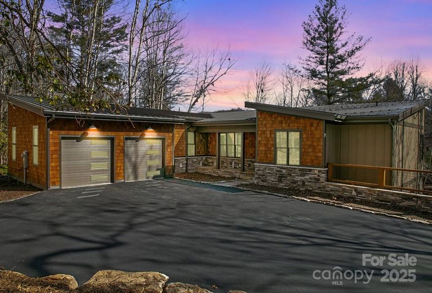 Welcome to this stunning contemporary custom home on Lake Tiaroga. This home has exquisite finishes and craftsmanship. The main floor boasts a very open floor plan with a great room that has a beautiful stone fireplace, chef's kitchen with top-of-the-line cafe appliances, primary bedroom, 2 full baths, an office (or 4th bedroom), laundry room, pantry and much much more. Downstairs you'll enjoy the huge family room, 2 bedrooms, 2.5 baths, gym, and a storage/flex room. Outside, you will love the natural surroundings and view of this tranquil lakefront lot while sitting on your screened porch or covered deck. From the basement deck, the lake is easily accessible from the level back yard.  It is just a short distance from the Clubhouse, Tennis Courts, pool, and all of the wonderful amenities offered by Connestee Falls, a highly desirable gated, golf community. Connestee Falls is only minutes from Downtown Brevard and all of its conveniences. This home is a must see!