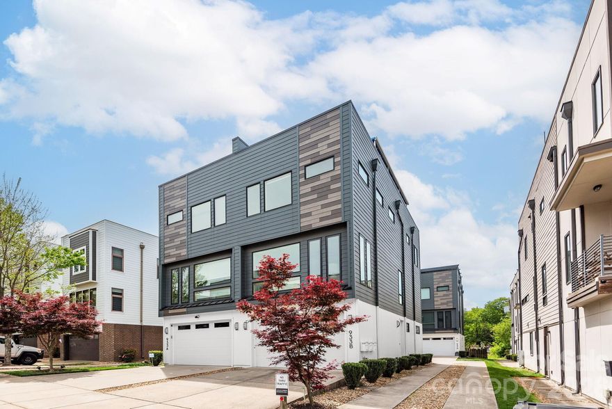 Contemporary uptown condominium in popular Third Ward. Don’t miss this spacious unit with 3 bedrooms, 3.5  baths, open and bright living spaces, and an amazing rooftop patio that looks out over the Charlotte skyline. 

Close to everything….You are within blocks of the Carolina Panthers and the Charlotte FC stadium, the Hornets basketball arena, and the Knights baseball field. Irwin Creek Greenway and Frazier park are minutes away as well as four other parks (Romare Beardon, First Pres, First and Fourth Wards) within easy walking distance. Walk out your door to the Belk, Blumenthal, Knight and Carolina theaters, Spirit Square, Charlotte Ballet, Discovery Place, the Mint Museum and the new uptown library opening in 2026.  Restaurants are on every corner as well as a Harris Teeter grocery store and a CVS drug store.

Top of the line kitchen sports stainless steel appliances, including gas stove with hood, custom cabinetry, and a handsome center island. Don’t miss the custom features, including white oak hardwood floors on main and second levels, concrete floors in lower level, multi-zone HVAC system, and tankless water heater. Living areas freshly painted in 2026, neutral tile baths and high ceilings.

Small, manageable HOA consists of the four units in this block. Dues are $300 per month and include water, building and common area maintenance, facility management, and termite and pest control. Two car garage with extra driveway space for parking.