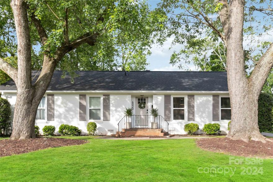Welcome to this tastefully renovated, ranch home located in desirable Montclaire in South Charlotte.  As you step inside, you'll be greeted by a spacious living area with plenty of natural light, creating a warm and inviting atmosphere. The open floor plan seamlessly connects the living room to the kitchen and dining area with fireplace and a custom built-in bar area perfect for entertaining guests or enjoying family meals. The kitchen is a chef's delight, boasting a large kitchen island, modern appliances, and ample cabinet space. The primary bedroom is a peaceful retreat, complete with an en-suite bathroom for added privacy and comfort. Outside, the property features a well-maintained, fenced-in backyard perfect for relaxation or outdoor activities. This home provides easy access to a variety of parks, shopping, dining, and entertainment options. Roof replaced-2023. Furnace & a/c unit replaced-2019, new HVAC duct system-2024. Encapsulated crawl space w/dehumidifier in 2022.