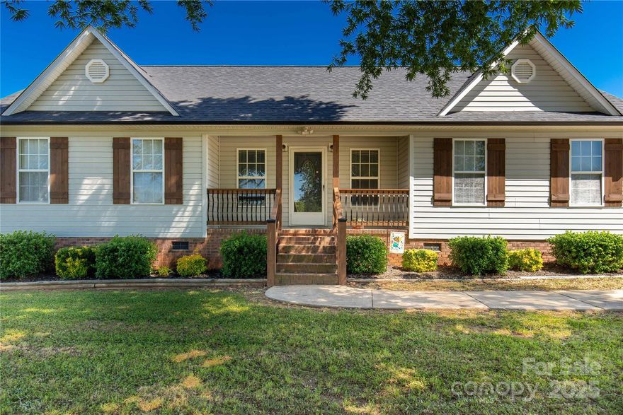 Welcome to 1560 Springlake Rd. This beautiful home features a new roof (2024), updated interior, and a large 30x40x12 shop in the fenced backyard. The spacious open living room area boasts a vaulted ceiling and a striking fireplace. The kitchen includes new granite countertops and stainless steel appliances. The home offers three bedrooms and two full baths. The bathrooms and laundry have been remodeled. The exterior is warm and inviting, showcasing the lovely front porch and rear deck, perfect for entertaining. This gorgeous property is ready to welcome you HOME!
