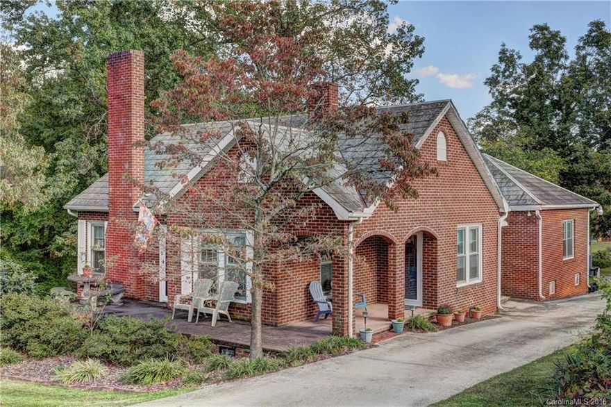 Cute, well-maintained brick cottage in the heart of Concord convenient to everything (hospital, mall, downtown, I-85). Character throughout from the tall chimneys & arches on the covered porch to beautiful strip oak floors, French Doors, fireplaces & moldings. 4th bed could also be family room.  Updated kitchen features farmhouse sink, attractive countertops & tons of cabinetry. Master suite w/ walk-in & full bath w/ double vanities. Garage & workshop in the basement offer tons of storage.