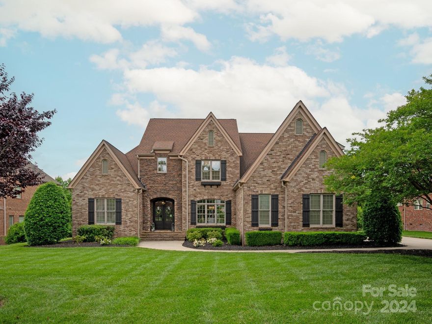 Beautiful completely remodeled LUXURY home in popular gated Providence Downs community. Great floor plan features primary bedroom on main floor PLUS additional guest suite with full bath.
Lovely upscale interior features designer lighting throughout and fresh neutral paint. Primary Bedroom is a true oasis with hardwood floors, trey ceiling, his and her custom closets and completely remodeled luxury bath featuring quartz tops, luxury oversized shower and vessel tub. Lovely kitchen features quartz tops, designer tile backsplash, built in fridge and gas cooktop overlooking cozy keeping area with gas fireplace surrounded by custom built-ins. Upstairs features 2 large secondary rooms, 2 full baths, large media room plus additional bonus room. Large LEVEL backyard with privacy lanscaping! Lovely screened porch with additional stamped concrete patio. Well for irrigation! MOVE IN READY.