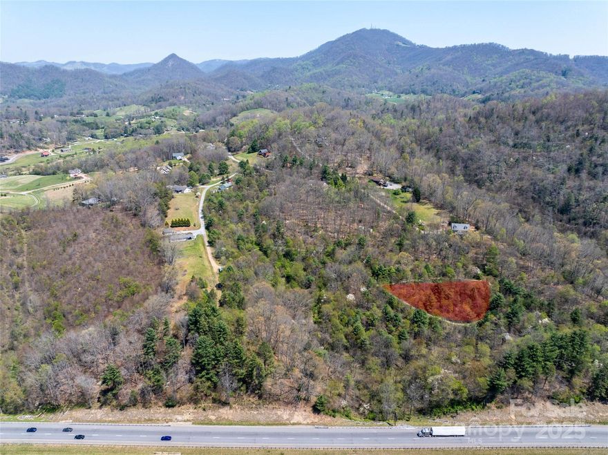 Discover the perfect mountain retreat with this beautiful 0.74-acre home site located in the
desirable Hyder Mountain Acres subdivision, nestled in the heart of Haywood County and the scenic
Blue Ridge Mountains. With selective trimming, the property boasts stunning panoramic views—ideal
for enjoying the peaceful mountain setting. Conveniently located near I-40, this lot provides quick
access to Asheville, Tennessee, and all that Haywood County has to offer. The subdivision requires
only a 1,000-sqft min build, offering great flexibility for your home design, manufactured not
allowed.