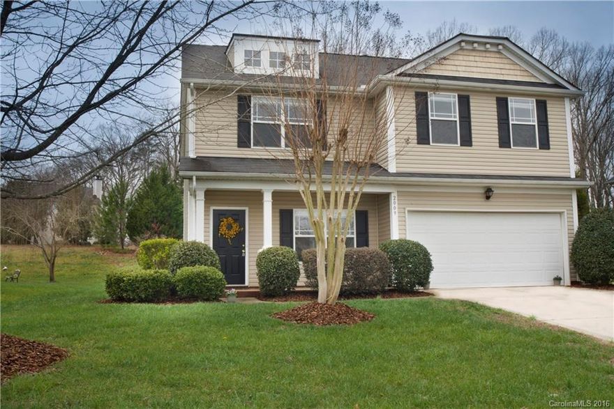 STUNNING HOME!  Brand new carpet, paint, and stainless dishwasher, stove & microwave!  Move right in!  Gas fireplace in large living room, enormous kitchen with tons of counter tops and cabinetry. Upstairs boasts huge bonus room, 3 large - bright & sunny bedrooms with loads of closet space.  Master bedroom retreat with garden tub & shower.  Wonderful private treed yard. Perfect location - can walk to town for restaurants, shopping & town activities. Hurry - it won't last!