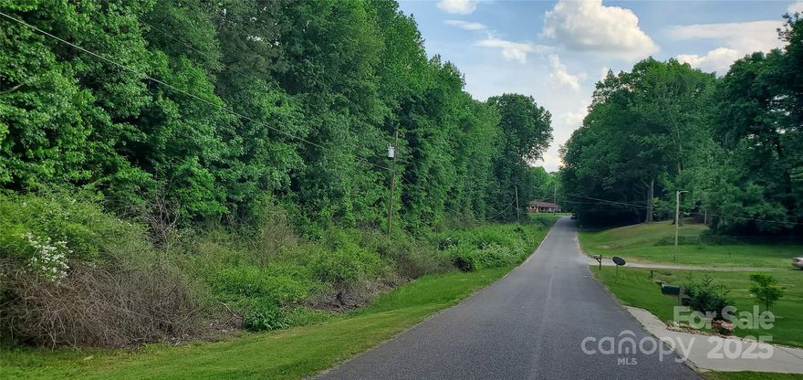 Wooded R-20 lot with public water