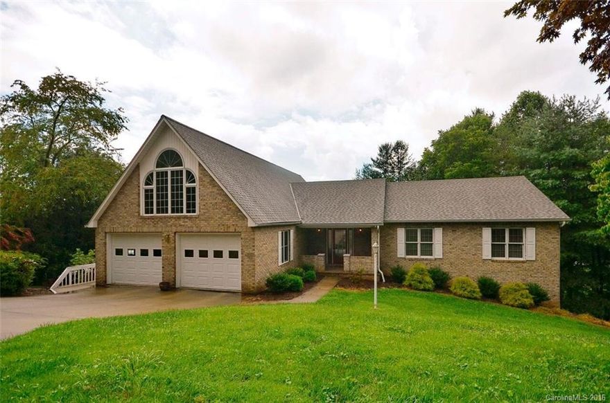 You will love the easy, one-level living in this beautiful 3 bedroom brick home, in town! Enter from level walkway into the large, open LR. Very sunny rooms. Great room also on main level. 2 Gas FP. New kitchen vinyl flooring and 2015-new kitchen microwave, refrigerator and electric range. 2014-new 50-yr roof. 15 ft ceiling lower level Family Rm, full bath & storage galore! Bonus room over Garage. Long range mountain winter views of the Blue Ridge Parkway. Oversized double Garage. No HOA dues.