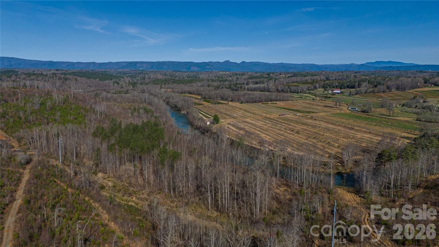 Attention Developers, take a look at this hard to find approx 83 acres of rolling topography within minutes of downtown Morganton or Glen Alpine or Beautiful Lake James. This property offers approx 1280' of paved road frontage on Hwy 70 and approx 2100' of river frontage with amazing long range views of Table Rock and Shortoff mountains. This could be your own private estate or multi housing community. Tons of possibilities! Call today for a private showing. Buyer agents welcome. $1,150,000
