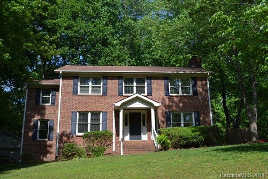 Awesome brick home in wonderful neighborhood.  Formal dining room, huge great room with fireplace/gas logs.  Updated kitchen has granite counter tops, work island, gas cook top, double oven, stainless appliances and tile back splash.  Large deck, fenced back yard, double garage!  Hardwood floors throughout main level.