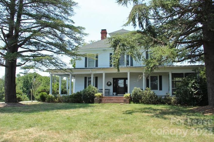 Historic home in Lake Wylie. Privacy, land and plenty of space for entertaining while conveniently located near shopping and schools.Approximately 4500 sq feet,4 bedroom/2.5 bath home with a detached 3 car garage and golf-cart bay.Lg front porch perfect for rocking chairs, screened porch on the side, and deck in the back provide generous outdoor space. The first floor includes a large entry, living room, dining room, den, kitchen, half bath, primary bedroom and primary bathroom.Hardwood floors in the entry, dining and den, high ceilings, and a dedicated ac/heat pump provide plenty of room on the first floor. The second floor includes a large center room, a bathroom off the center room, 3 bedrooms, a large walk-in closet and has a separate ac/heating system .On well, and septic. No HOA fees! Pets welcome pending approval from owners. Appliances include electric oven, electric stove, dishwasher, refrigerator, gas fireplace in den and primary bedroom. Available for rent September 2, 2023.