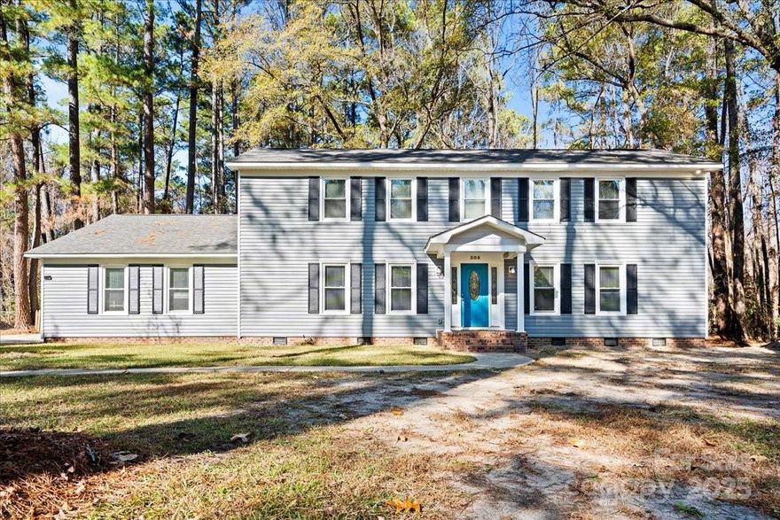 Welcome home to this beautifully updated 5-bedroom, 3.5-bath property tucked at the end of a quiet street on a shady,tree-lined lot. Step inside to a bright, fresh interior featuring new flooring, stylish molding and custom beam details that add warmth and character to the main living area. The upstairs features a small bonus room, perfect for a home office or playroom, and completely renovated bathrooms. The kitchen has been completely transformed with sleek countertops and all updated appliances offering a modern, move-in-ready space for cooking and gathering. A charming sunporch overlooks the fully fenced backyard, perfect for relaxing or entertaining. A separate laundry room with a convenient half bath adds everyday functionality, while abundant closets and storage throughout the home ensure everything has its place. The property also includes a 2-cargarage for additional storage and parking. With its thoughtful upgrades, serene setting, and spacious layout, this home blends comfort, style, and convenience—ready for its next owners to enjoy.