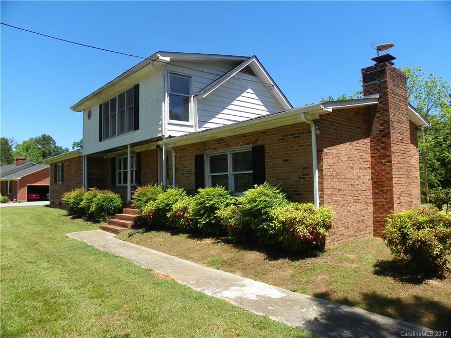 Charming older house built in 1940 - Sold as is / Fresh paint / 24x31 BIG Ole Country Kitchen with wood cabinets plus Walk-in Pantry / Laundry room with shelving.  Large Living Room has Fireplace with woodstove / Deck off Master Bdrm + Full Bath, Marble Whirlpool /2nd Bdrm has Fireplace & Double Door Closet /  3rd Bedroom upstairs is 25x15 / Covered Front & Side Porch / Big House for the $$$ - Priced $20K Under tax value, NO HOA DUES & Over an ACRE !!!  BETTER HURRY ..... Won't last long !!!