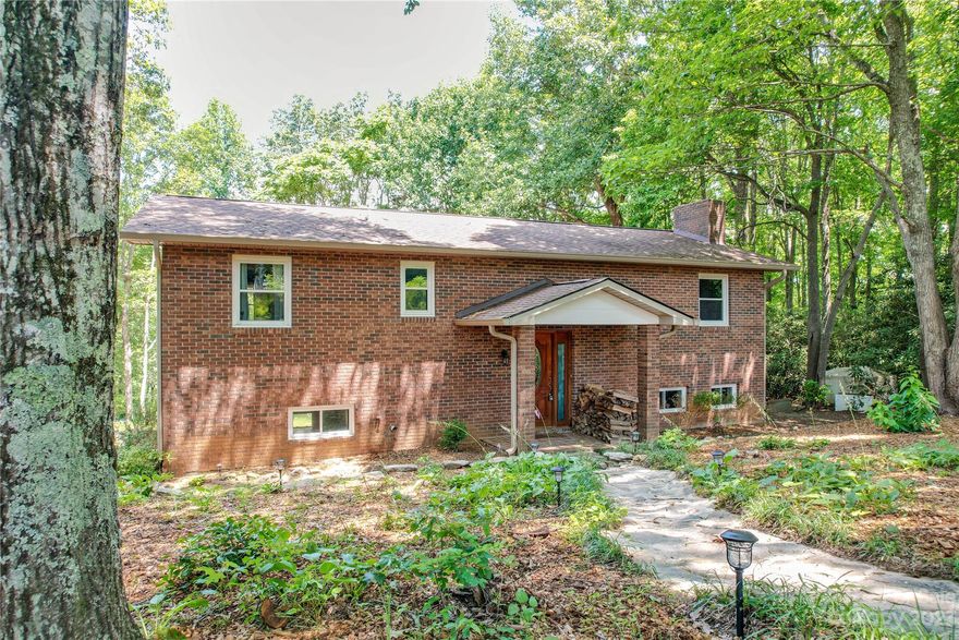 MULTIPLE OFFERS RECEIVED, HIGHEST & BEST BY 6PM 09/30/2023. Serene Mountain Living at its BEST! 3 bedrooms, 2 full bathrooms, and 0.92 acres smacked right on top of a mountain. Some recent renovations and cleared land allows you to move right in and enjoy and relax. Not ready to move in? Rent it out as a short term rental. Neighbors have had success as short term rentals here. Sit back and enjoy your mountain view from the covered balcony off the dining room. Take advantage of your large bonus room downstairs for an office, home theater room, game room, with the potential for a kitchen since there is plumbing hookup for a sink. Recent home inspection was completed on 07/25/2023. Please contact the listing agent for a copy!