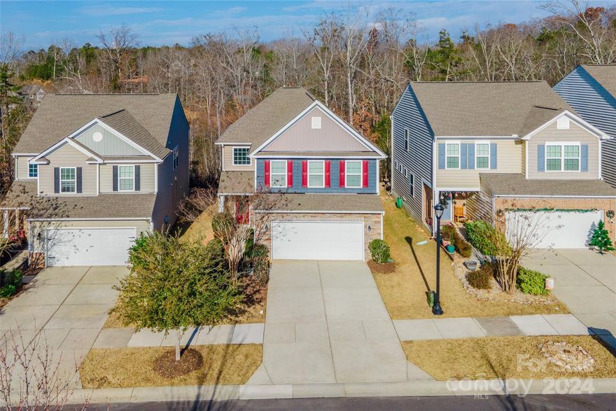 Welcome to this beautiful 4 bedroom, 3.5 bathroom home located in the highly sought-after Waterside at the Catawba community. Featuring neutral tones throughout, this home boasts beautiful wood floors in the main living areas, creating a warm and inviting atmosphere. The upper level is home to all four spacious bedrooms, including a luxurious primary suite with two closets and an ensuite bathroom with a dual vanity. One of the additional bedrooms also offers its own private ensuite bathroom. Step outside to enjoy the park views right outside your front door, and take full advantage of the incredible community amenities—two parks, two tennis courts, a fantastic clubhouse and more! This home offers not just a place to live, but a lifestyle you’ll love.