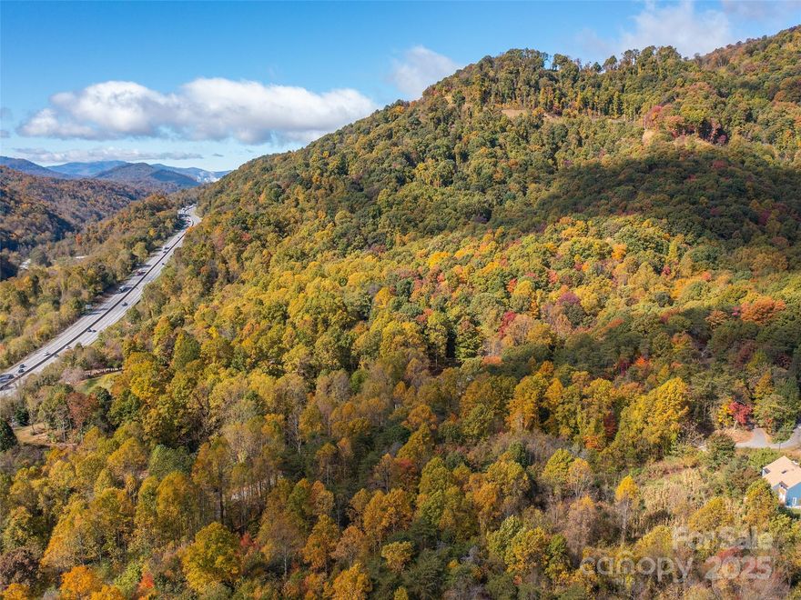 Don't miss your chance to own +/- 8.46 acres comprising of 4 individually platted homesites primed for building and development. Easy access right off I-40. Excellent location less than 15 minutes to downtown Canton/Candler and less than 25 minutes to Downtown Asheville and Waynesville. Great investment opportunity for developer or builder! Choose the ideal homesite for your dream home out of the 4 options, then sell off the rest or a keep a few surrounding you property for privacy acreage! Survey on file shows a right of way for access to the acreage where the roughed in road currently exists. Conveniently accessible yet private location tucked back in the woods. Mostly wooded privacy acreage with winter time views. Schedule your private showing today!