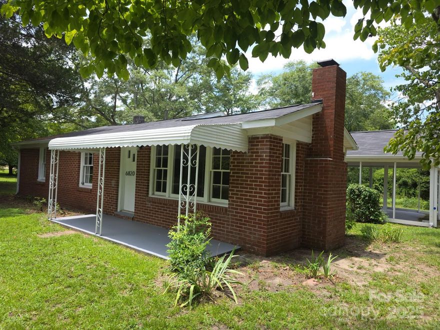 Check out this recently renovated house located on a shady lot in Kershaw! It features a front covered porch and double carport.  Updates include wiring, plumbing, new roof, new gutters, new HVAC, and so much more!  The renovated kitchen features new appliances, granite counters, cabinets and is open to the den/dining area. The full hall bathroom and half bath feature all new fixtures and are easily accessible from the three bedrooms. There is a spacious living room with fireplace and separate dining room for all your entertaining enjoyment or needs.