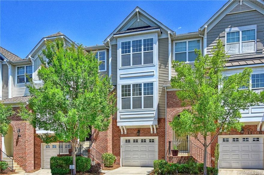 Excellent Upgraded Town home in a great location, convenient to Shopping and Restaurants.  This 4BR Town home has Kitchen with 42" Cabinets, Granite Counter Tops, SS Appliances, Private Deck, Large Living Room w/Fire Place.  Very Open Floor Plan w/Kitchen, Living Room and Break Fast Area well connected.  Hardwood Floors in Main & Lower Levels.  Guest BR and Full Bath in Lower Level.  Good Sized Covered Patio in the Back for Relaxing quietly.  Freshly painted and extremely well maintained.