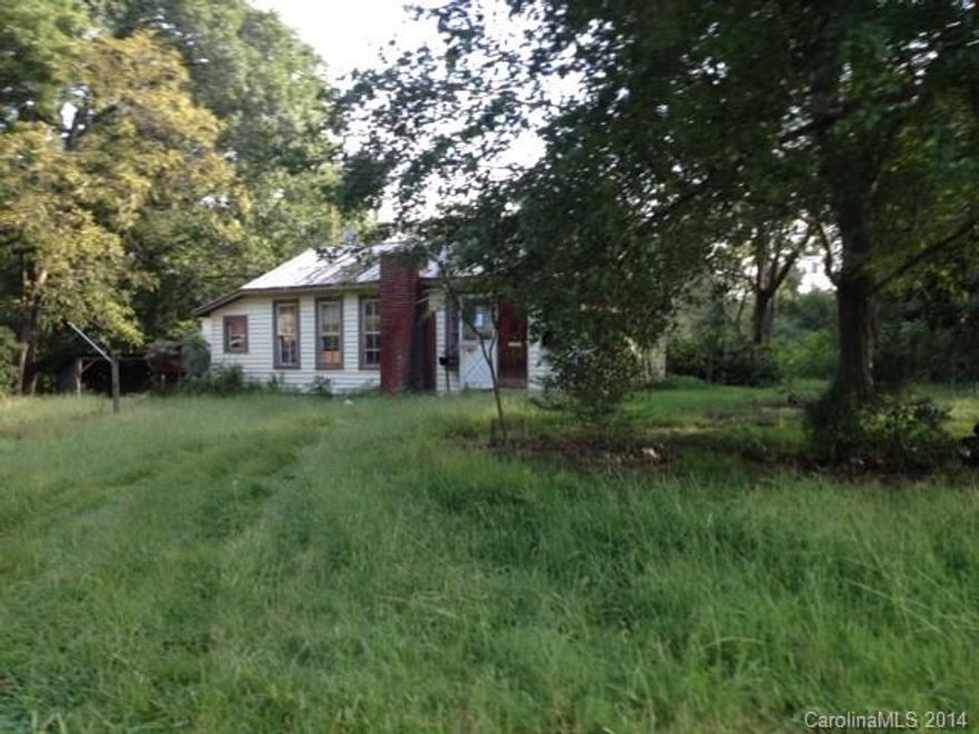 FIXER UPPER LOCATED IN HARMONY!!  Home sits on a 1 acre lot.  PRICED TO SELL!!  BRING ALL OFFERS!!