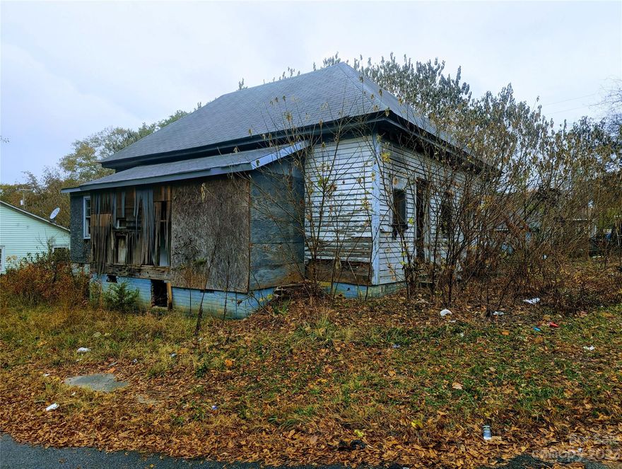 Great investment opportunity.  Corner lot.  Sold As-Is.