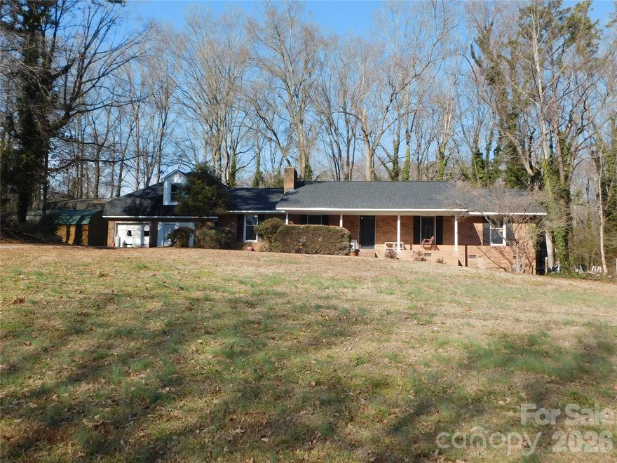 Great location with 3.62 acres in northern Union County, NC.  Only minutes from Unionville/Piedmont Schools, this brick ranch has 4 bedrooms, 3 full bathrooms, approx 2829 HSF. Interior has new flooring, new paint, new kitchen countertops. New roof, one HVAC unit is new. Nice open floor plan. Finished room over garage has 637 SF. One side of the two car garage has been enclosed but could easily be renovated back to original two car garage. Multiple storage buildings.  Home still needs some TLC but great potential to make it suit your own style.