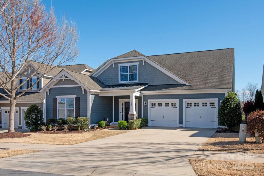 Fantastic 1.5-story home in Millbridge.  4 bedrooms, 3 full baths beautifully designed home with generous crown molding throughout.  Spacious primary bedroom on main level w/XL walk-in shower. Open main level w/ amazing kitchen, tons of counter space & desk area. Massive, extra-long island, ideal for entertaining & cozy stone fireplace in the living room. Two add’l bedrooms & full bath on main floor. Upstairs, a generously sized loft area, perfect for a second living space & a spacious bedroom and full bathroom. A private, flat backyard that backs to a tranquil common open area. The covered back porch and patio area are perfect for enjoying the outdoors year-round. Excellent neighborhood amenities including a pool, parks, walking trails, sidewalks, a clubhouse & regular community events.  Cuthbertson High School, Middle School & Kensington Elementary School. Homes on this street are rarely for sale;  Lawn mowing and edging are included in this section of Millbridge.