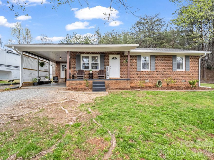Enjoy the perfect balance of privacy, mountain views and convenience with this updated brick ranch situated on 2.11 UNRESTRICTED ACRES. The home features 3 bedrooms & 2 full bathrooms on the main level, offering comfortable one-level living. Indulge in a private at-home sauna experience, seamlessly integrated into the covered outdoor living space, designed for ultimate relaxation. This property provides a peaceful setting while remaining close to area amenities, restaurants, and outdoor recreation. Just a short drive to Lake Lure, Chimney Rock and downtown Rutherfordton.