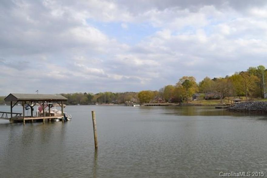 Come build your dream home on this fabulous lot with awesome view of the lake.  Over 100' of shoreline!  There is an approved septic permit that is valid until 2018.  There is a dock on the property and a screen porch structure.